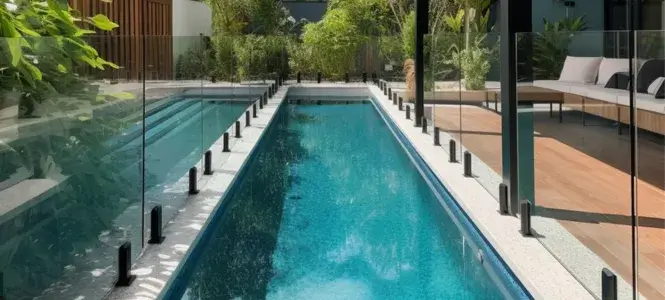 Front view shot of a stunning glass pool fence in Jimboomba